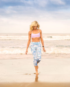 Catherine Grace O'Connell wearing a yoga pants at the beach